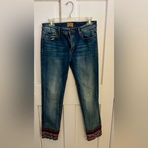 Blue jeans with decorative cuffs